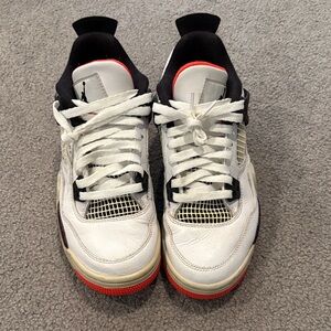 Jordan White and Black Kids Sneakers with Red Accents